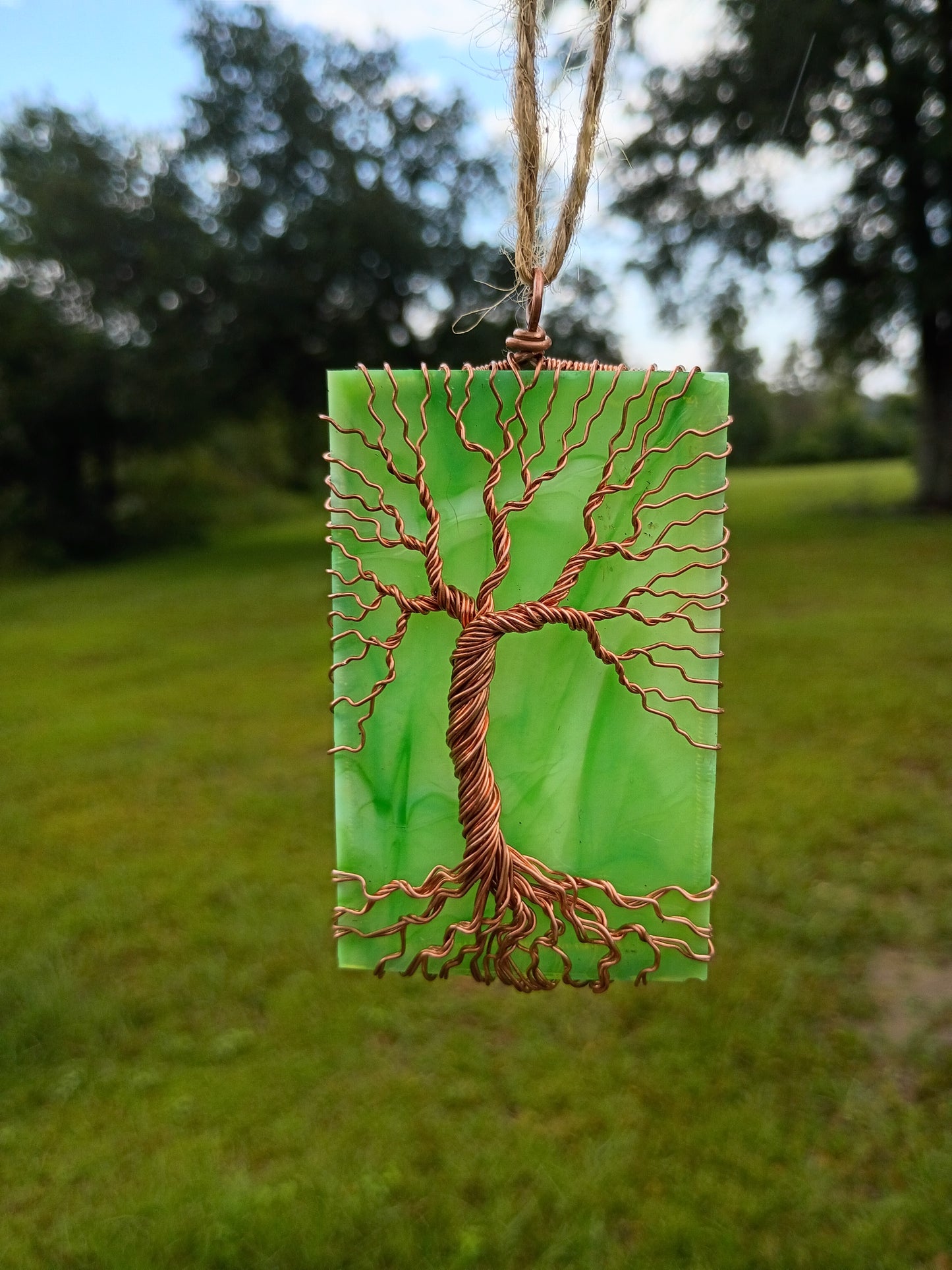 Green glass tree of life suncatcher