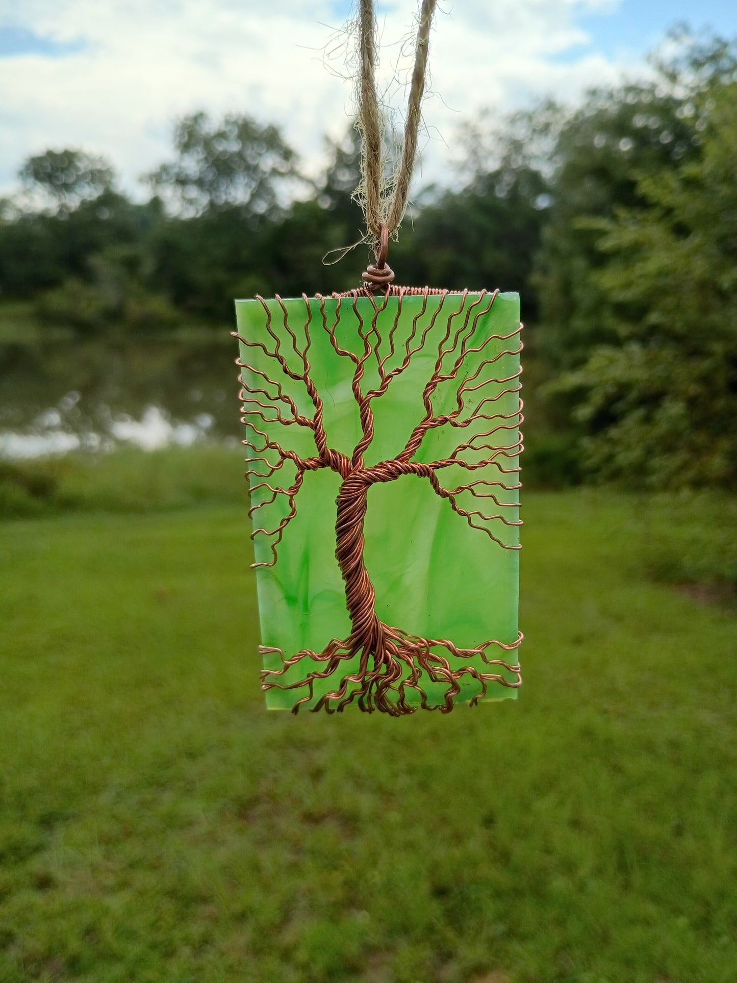 Green glass tree of life suncatcher