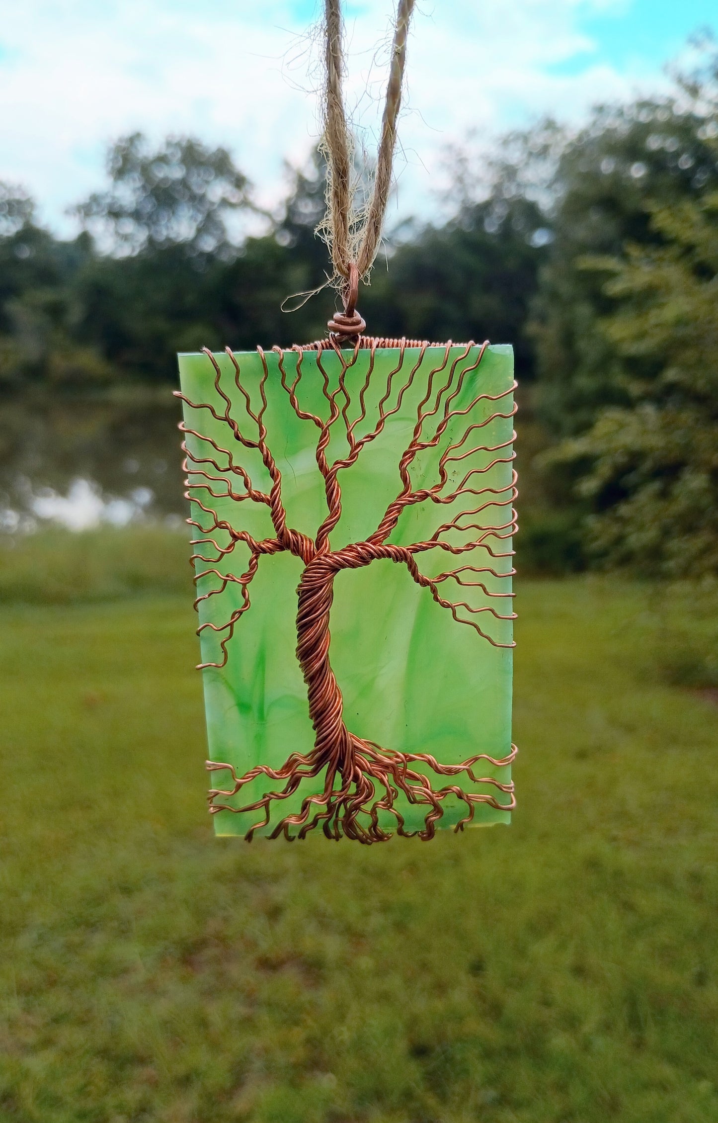 Green glass tree of life suncatcher