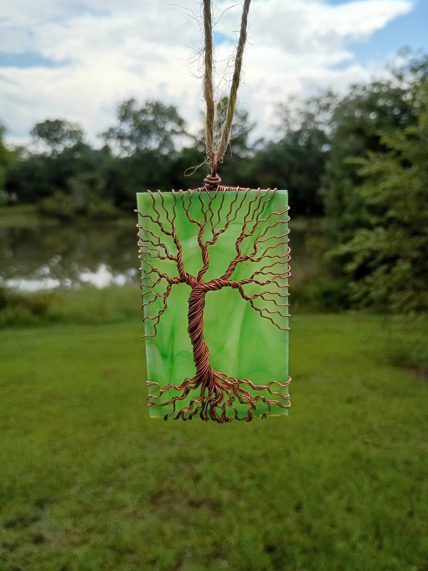 Green glass tree of life suncatcher