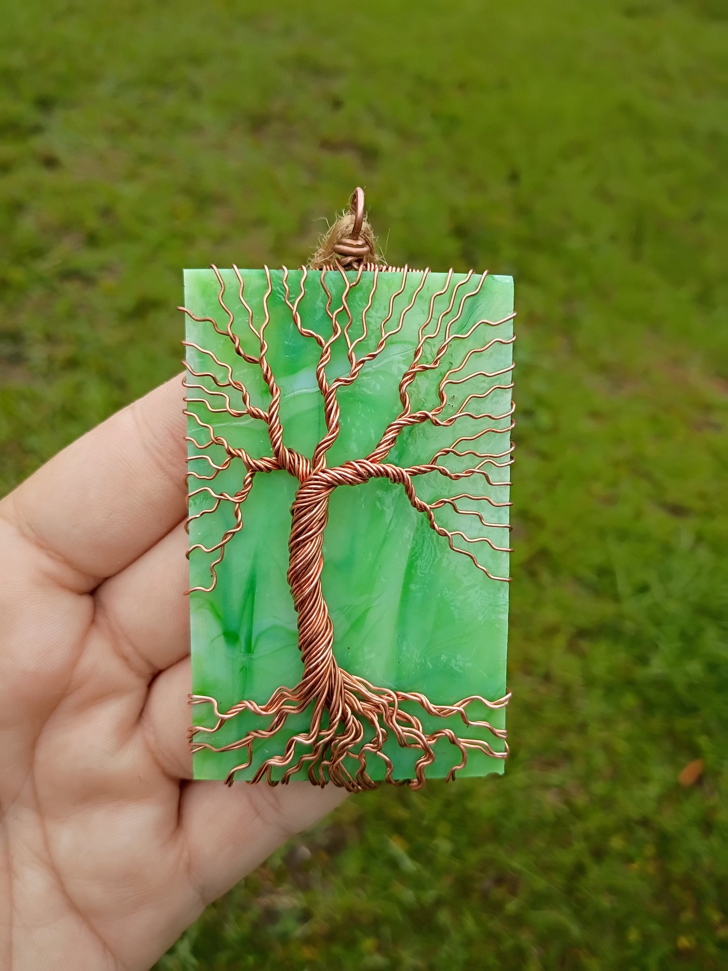 Green glass tree of life suncatcher
