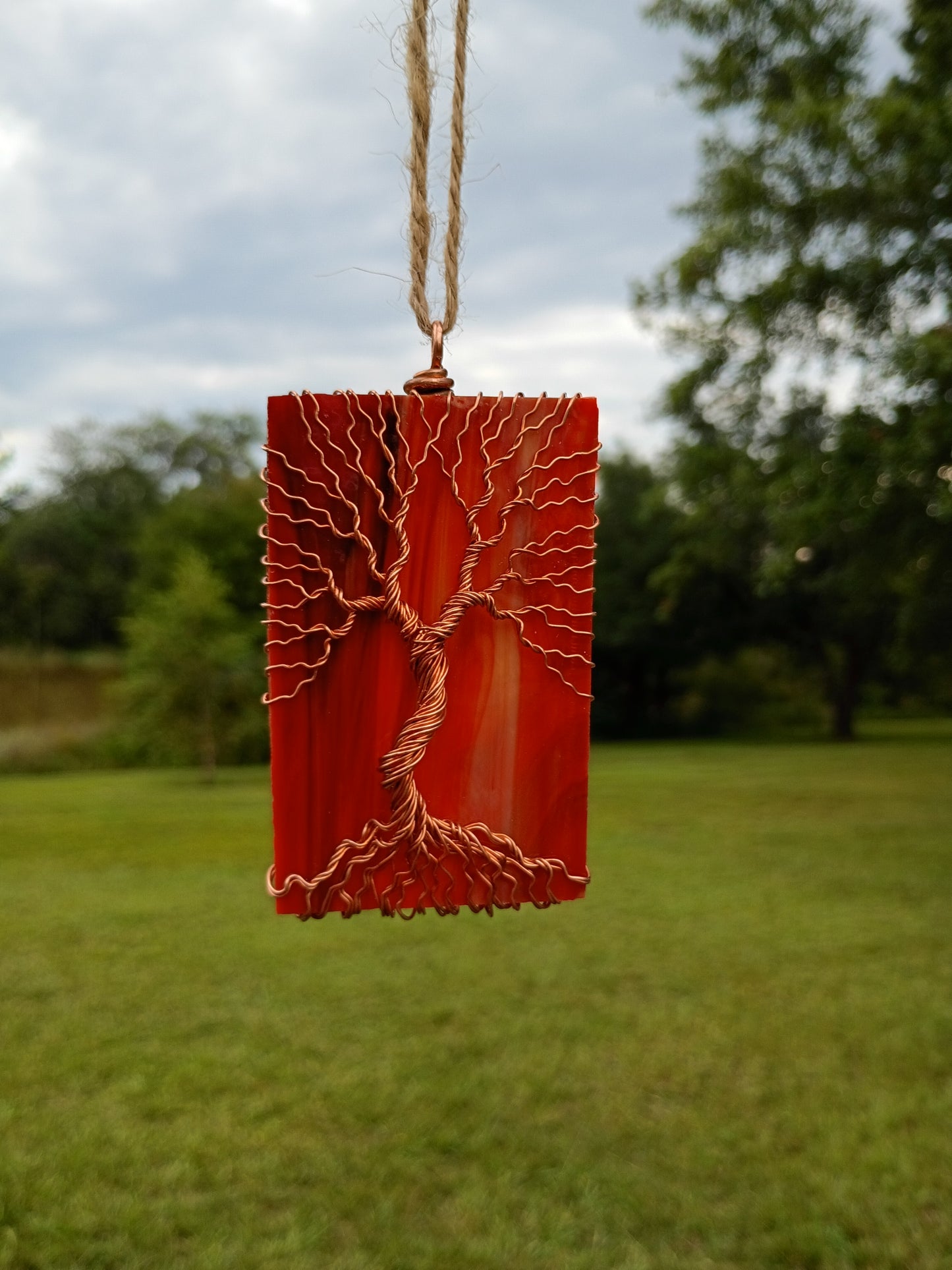 Orange glass tree of life suncatcher