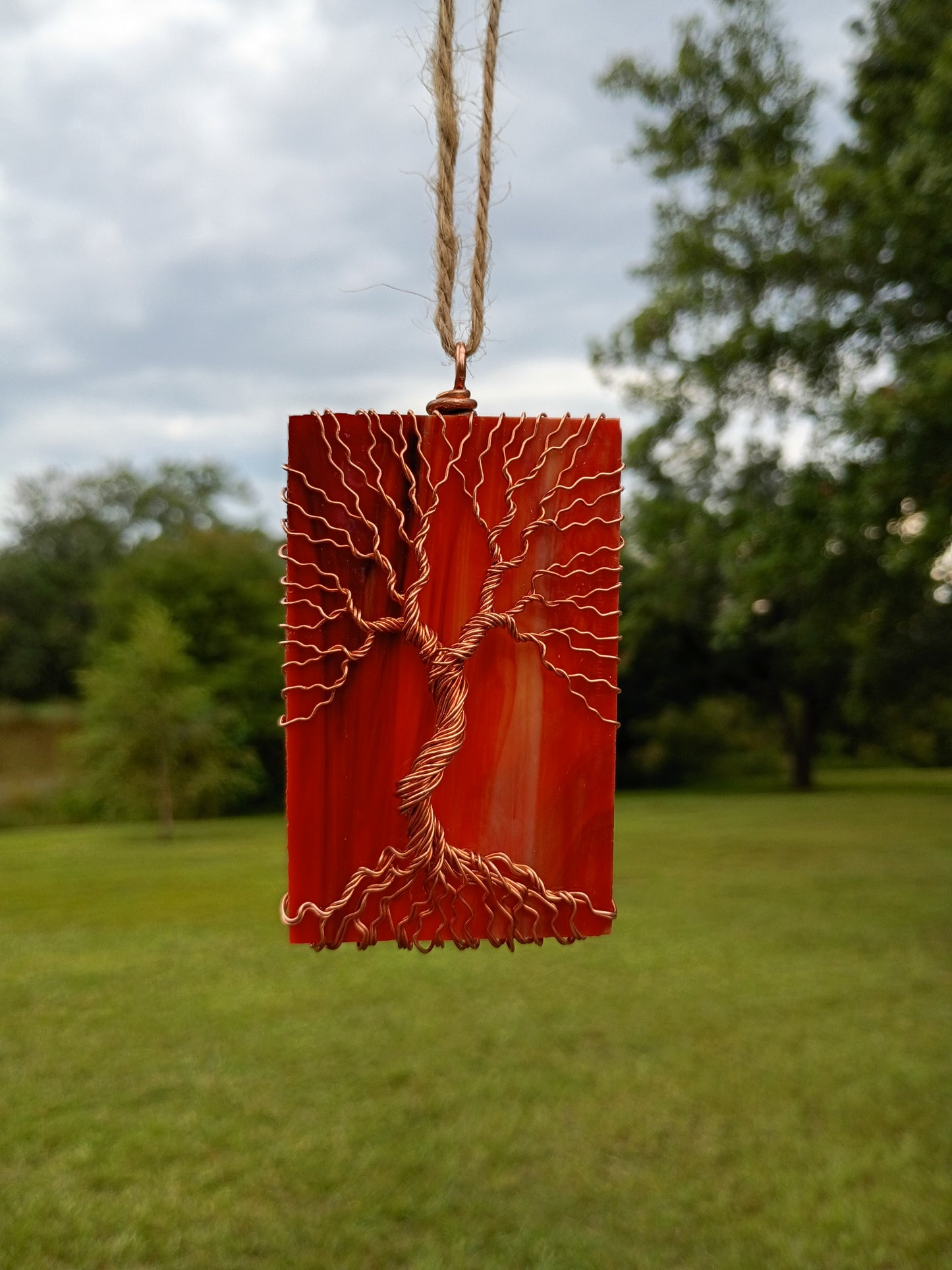 Orange glass tree of life suncatcher