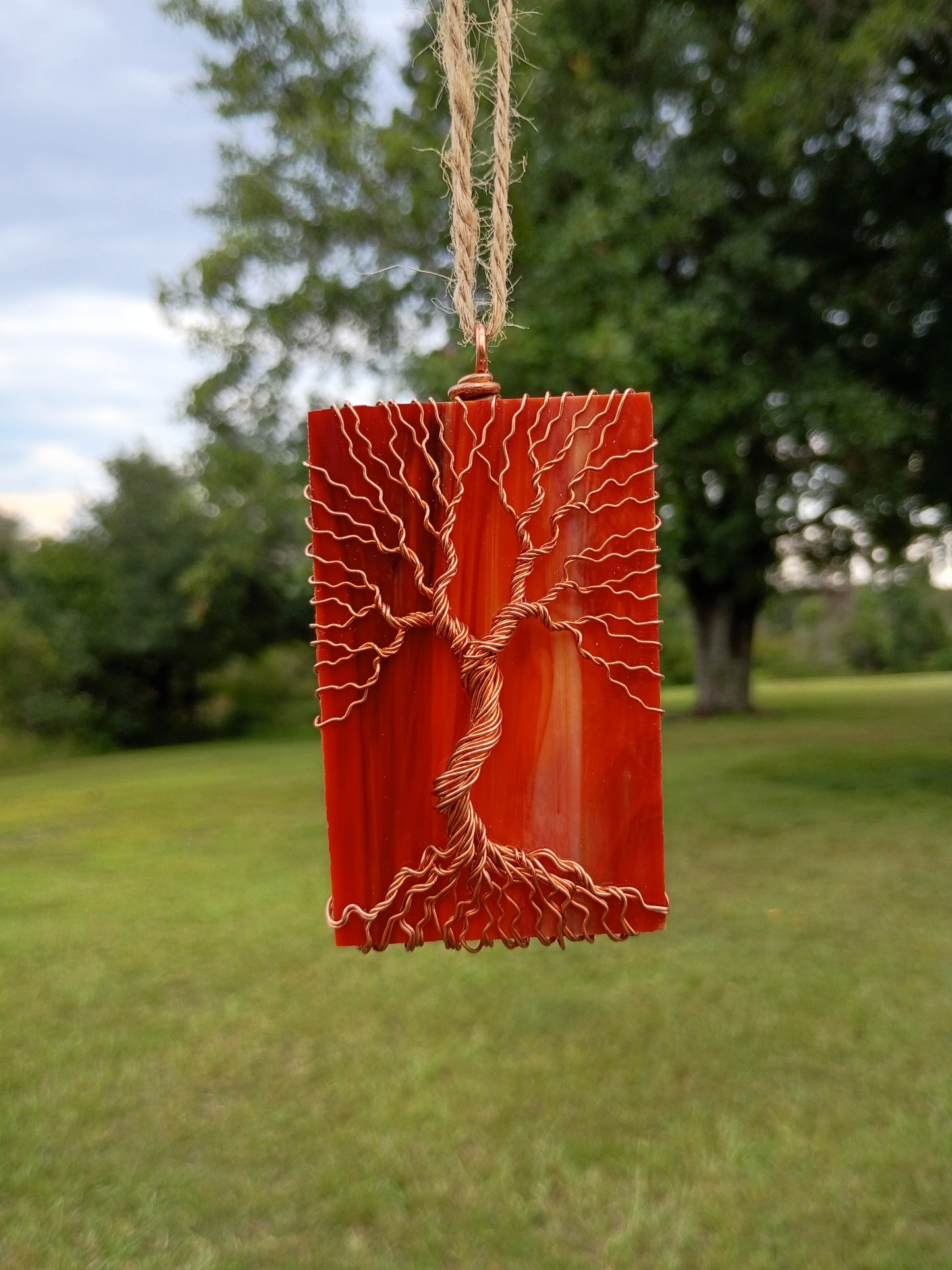 Orange glass tree of life suncatcher