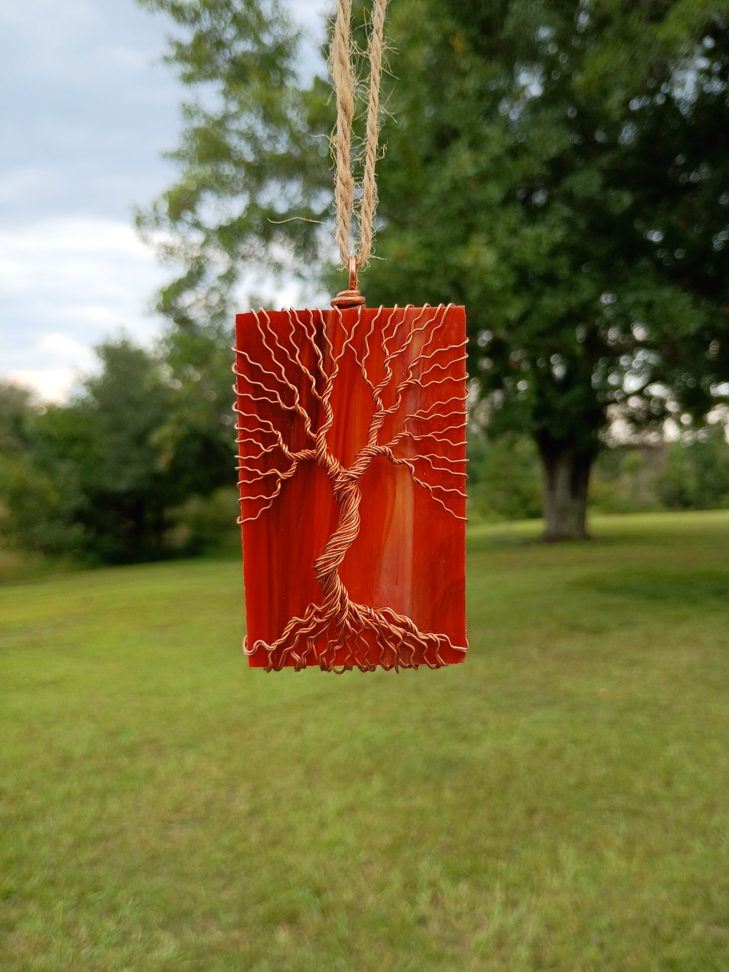 Orange glass tree of life suncatcher