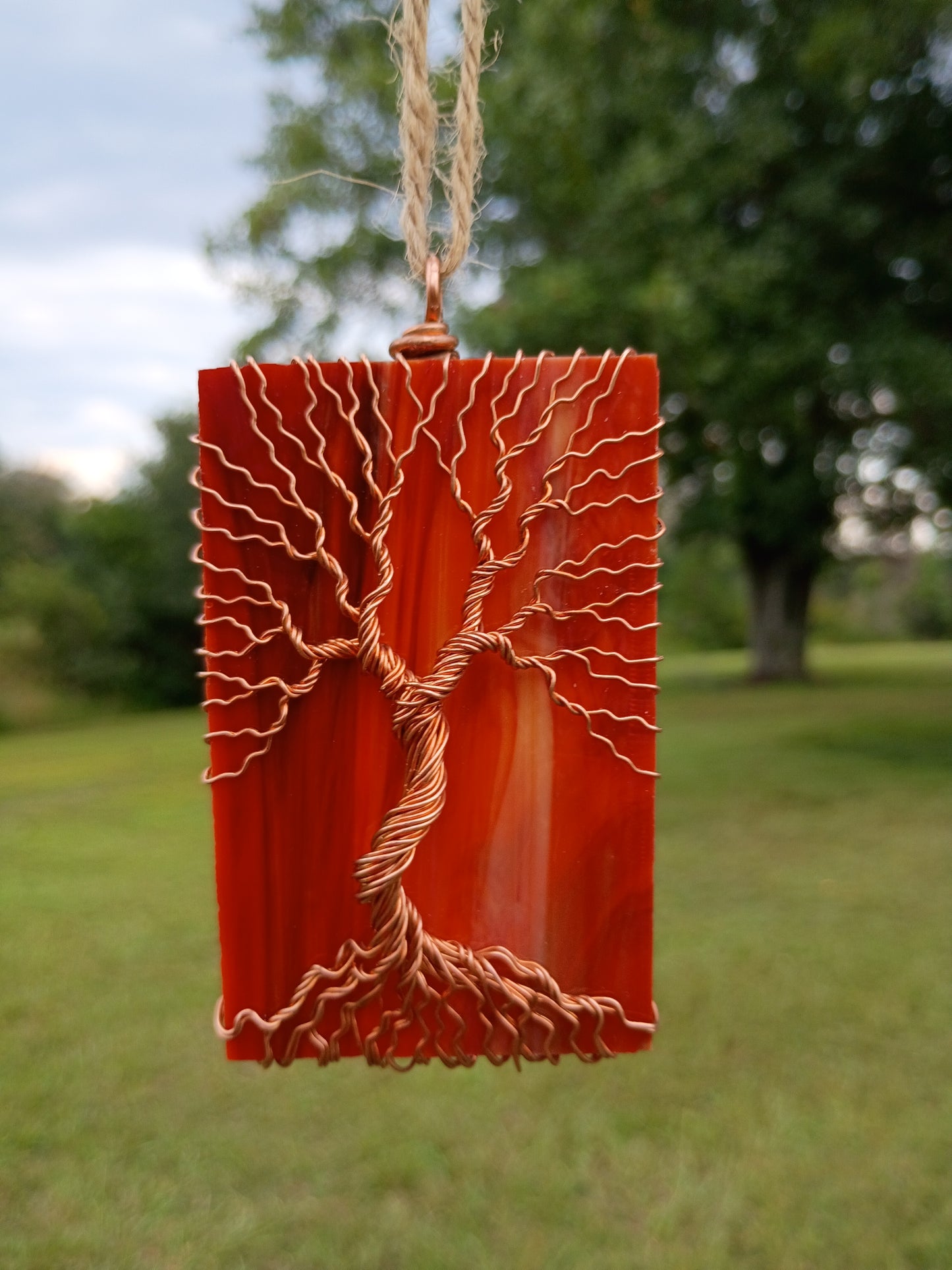 Orange glass tree of life suncatcher
