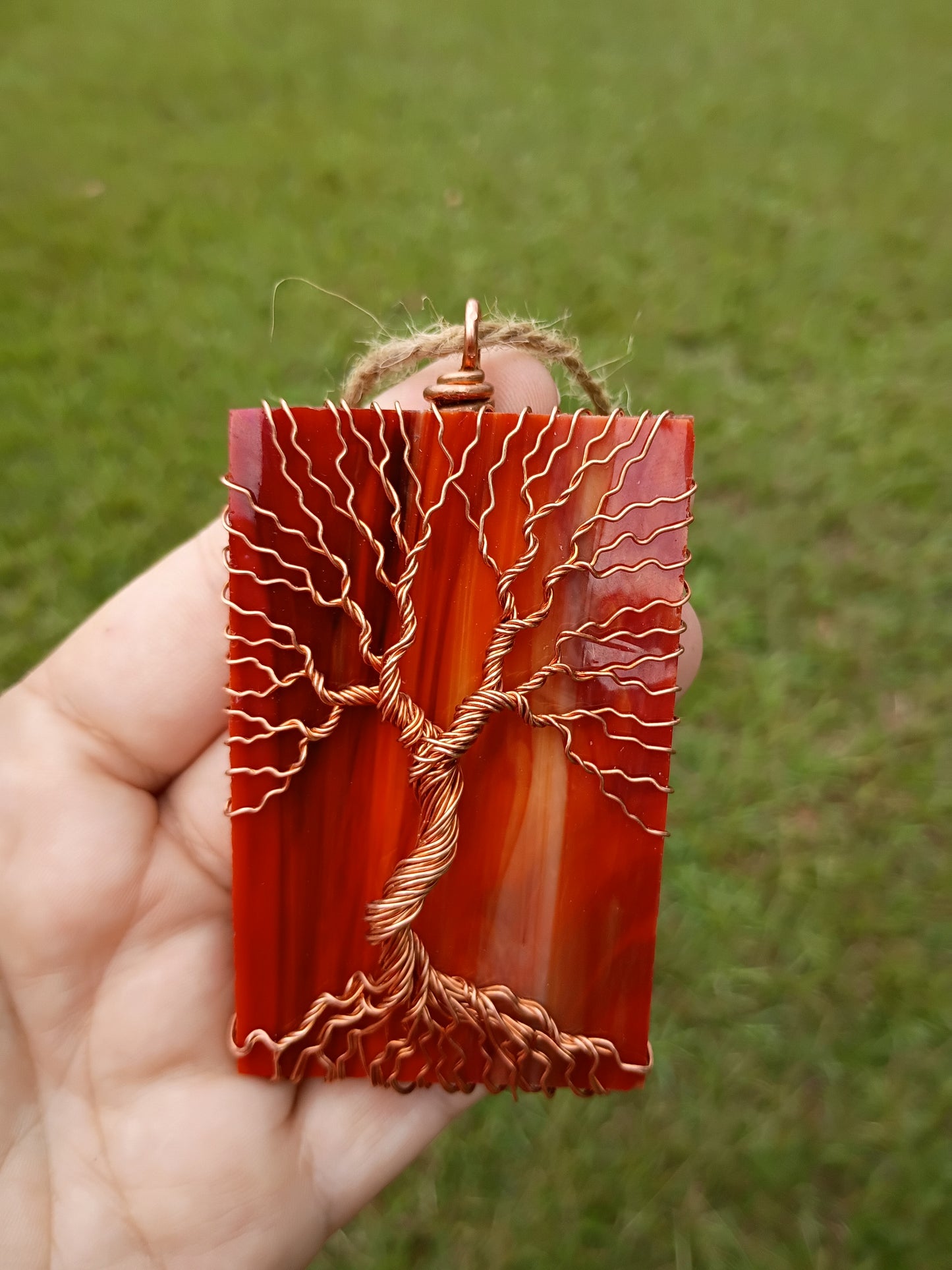 Orange glass tree of life suncatcher