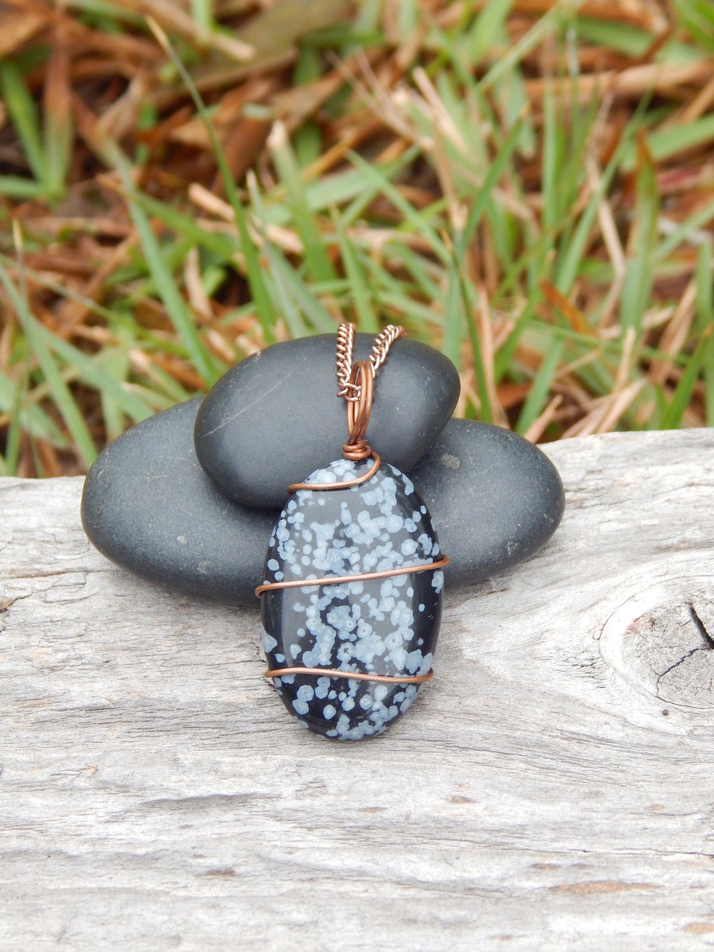 Snowflake obsidian wire wrapped pendant