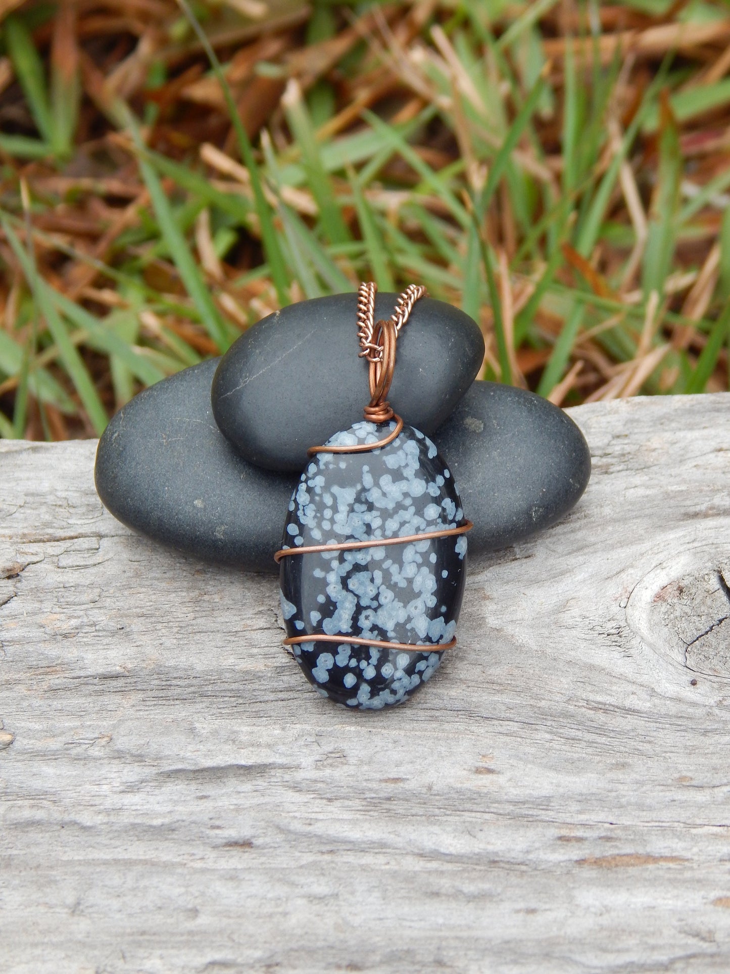Snowflake obsidian wire wrapped pendant