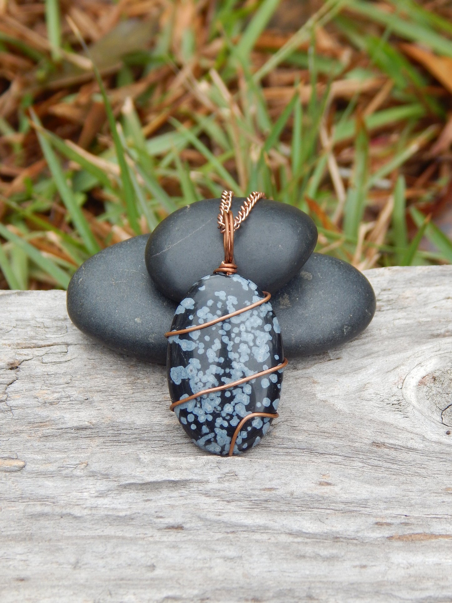 Snowflake obsidian wire wrapped pendant