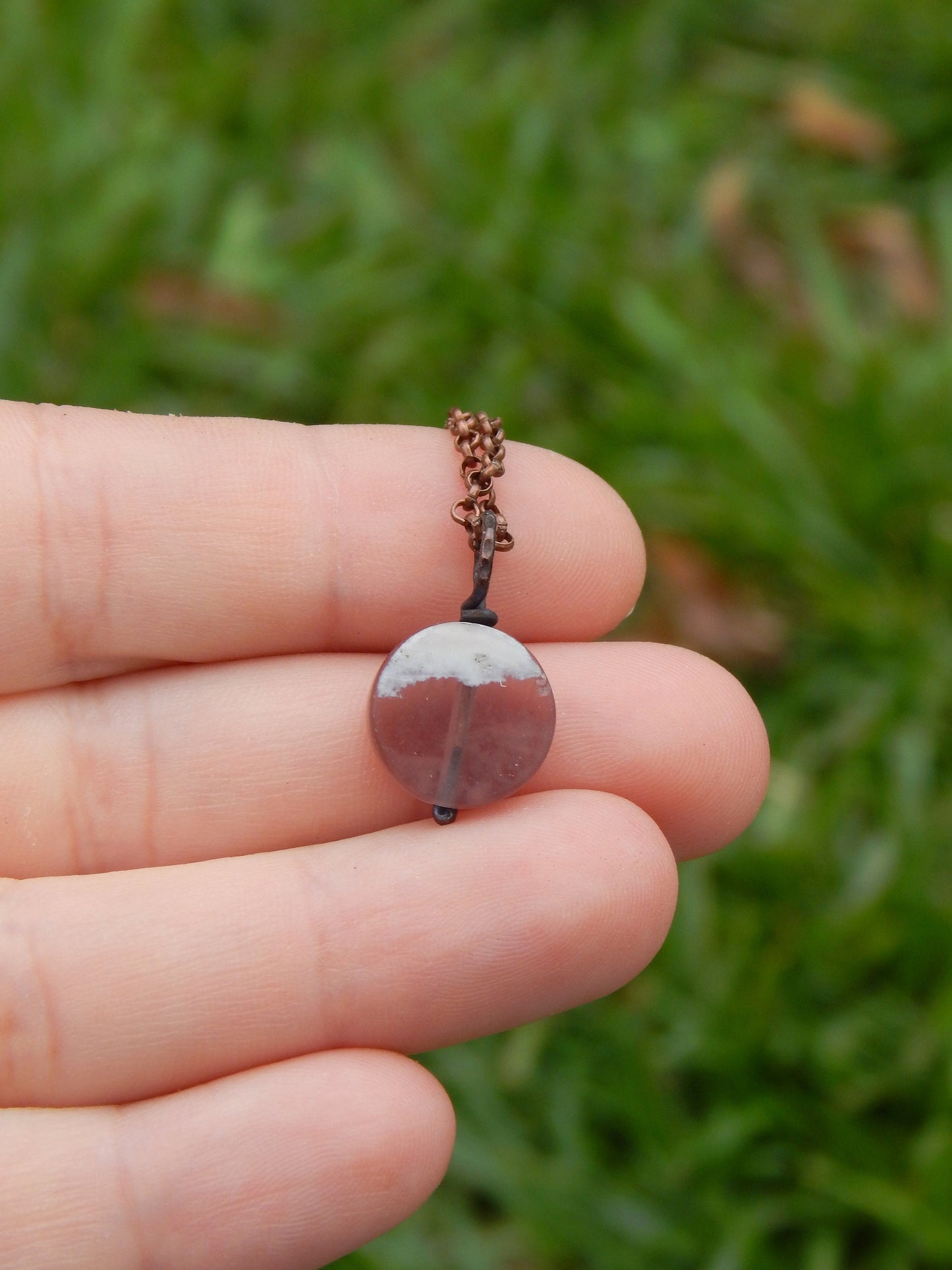 Purple fluorite wire wrapped pendant