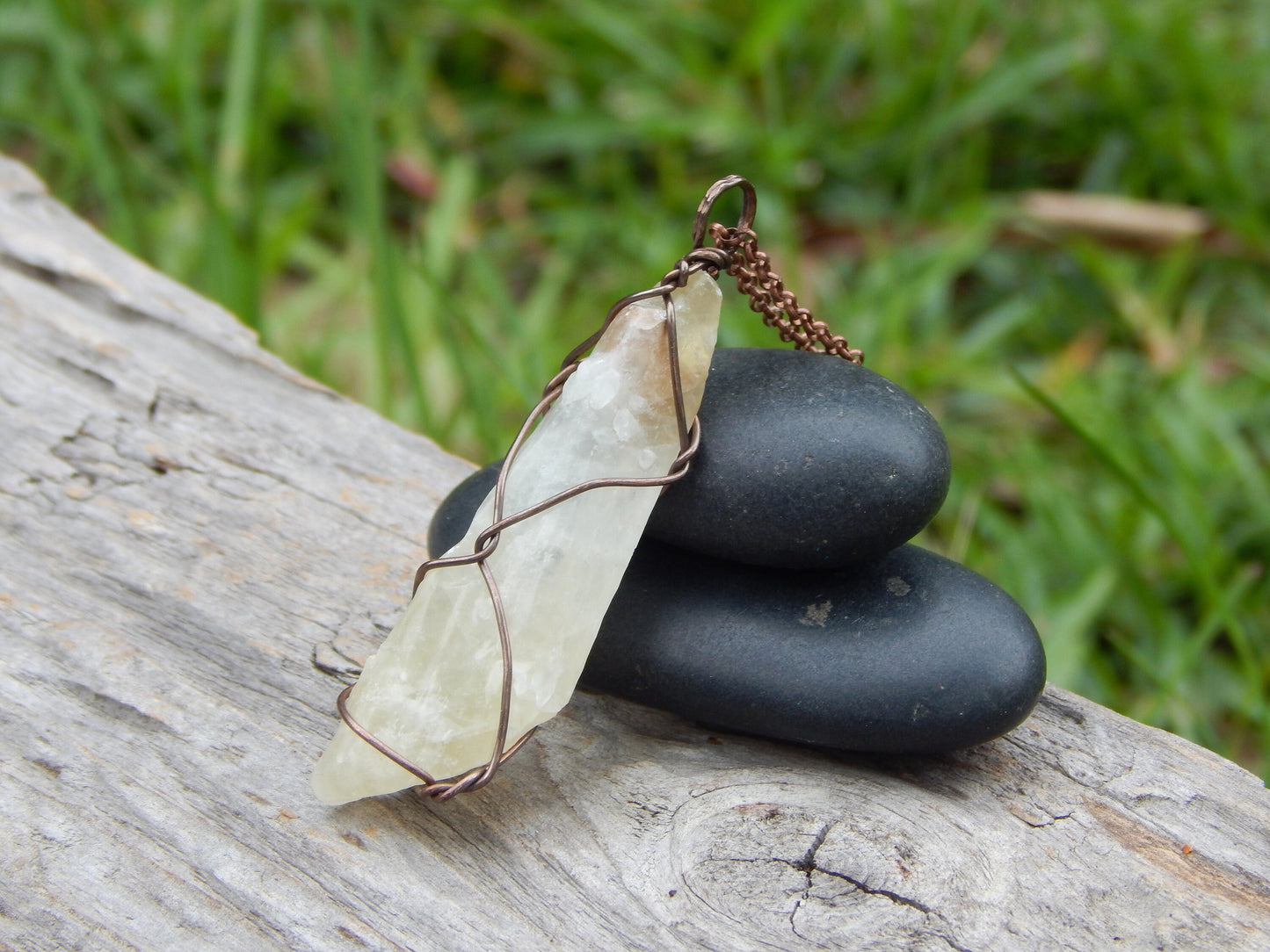 Raw calcite crystal wire wrapped pendant