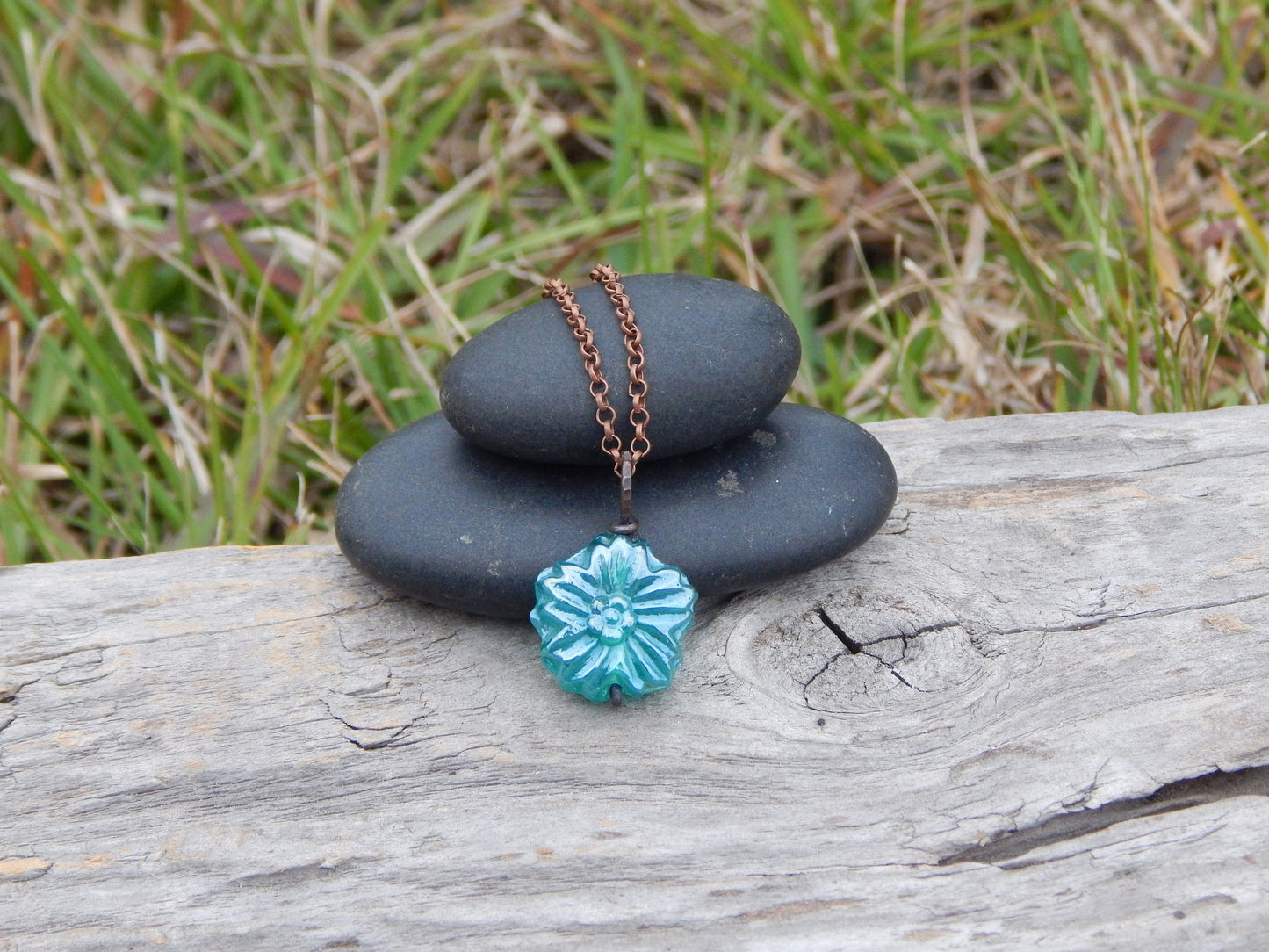 Dainty blue glass flower pendant