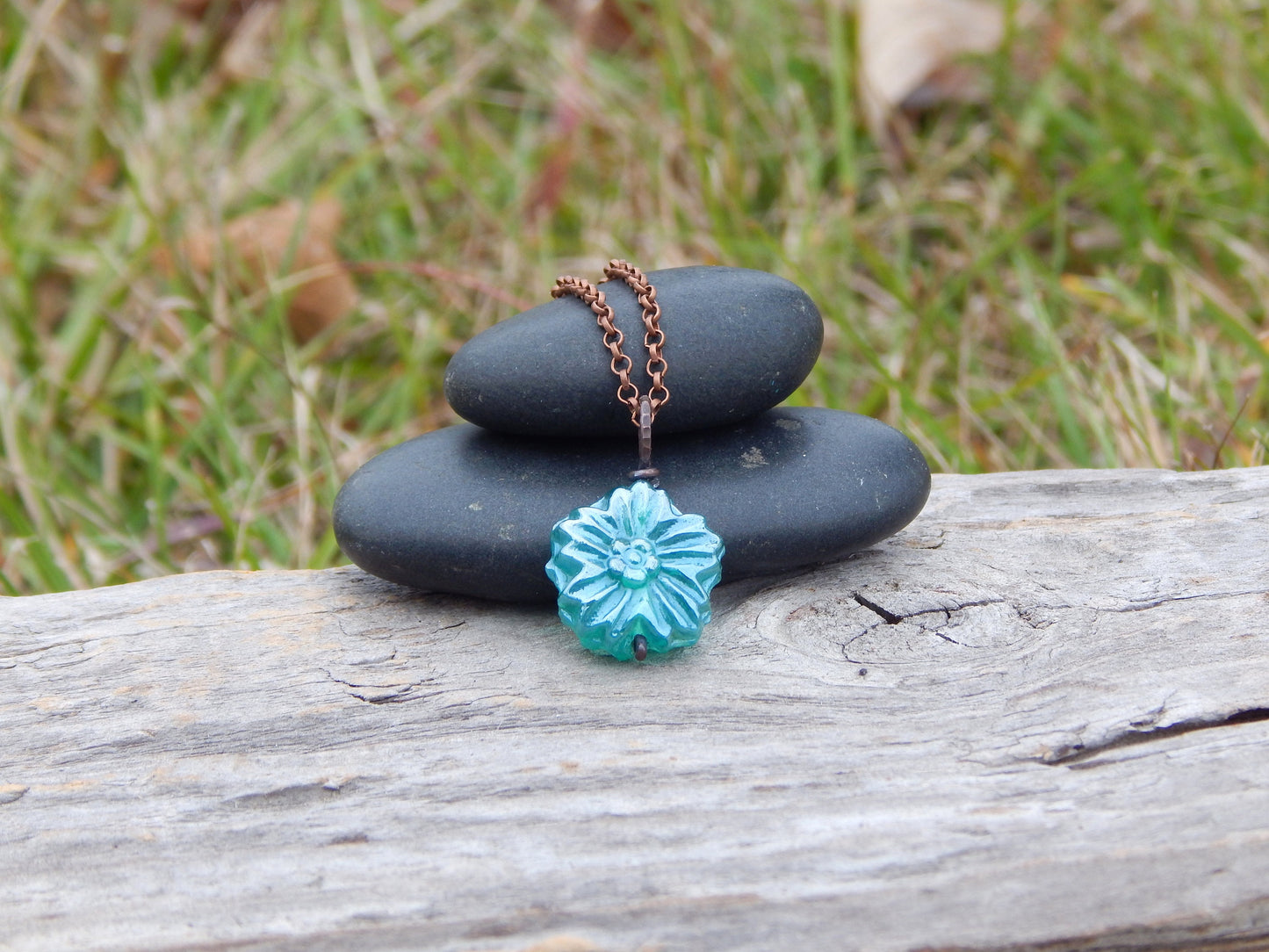 Dainty blue glass flower pendant