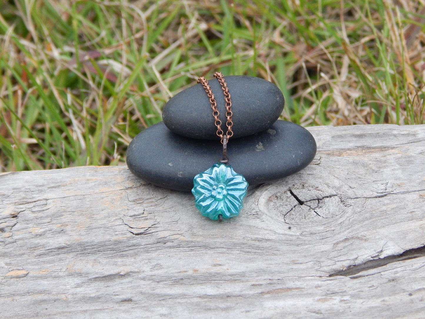 Dainty blue glass flower pendant