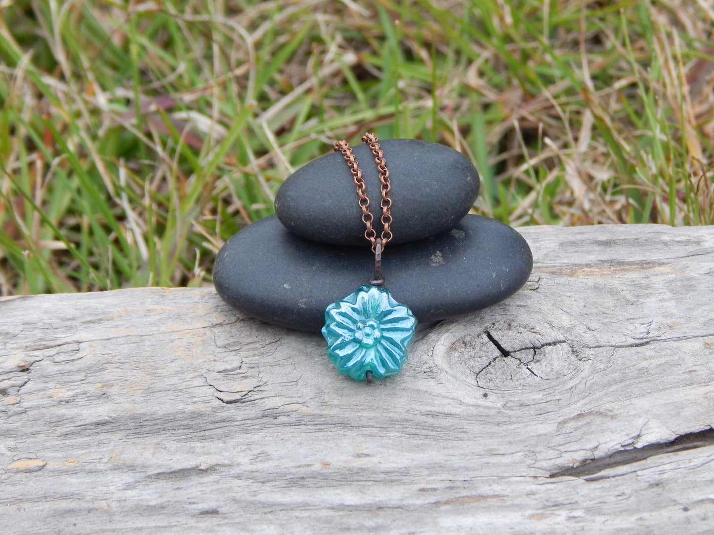 Dainty blue glass flower pendant