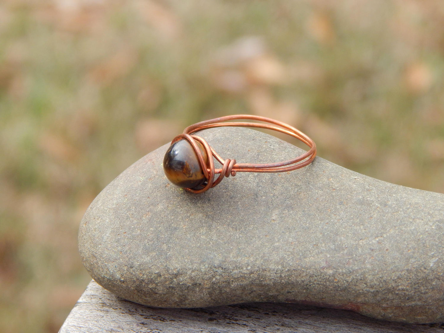Copper wire wrapped size 12.5 tiger eye ring