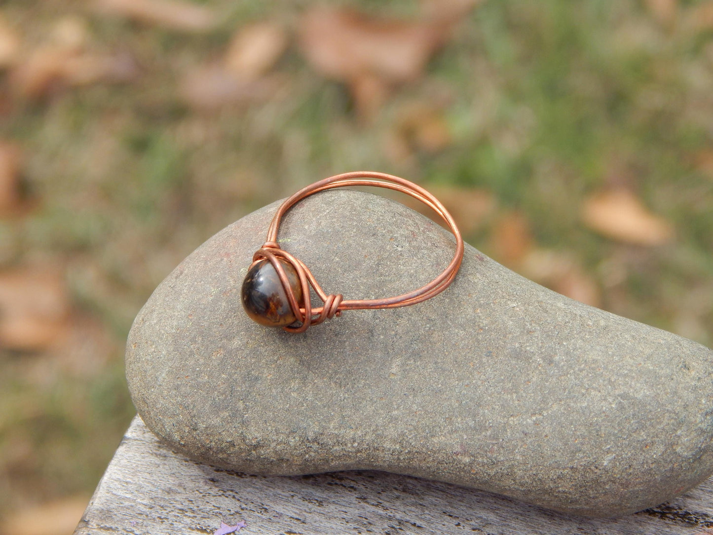 Copper wire wrapped size 12.5 tiger eye ring