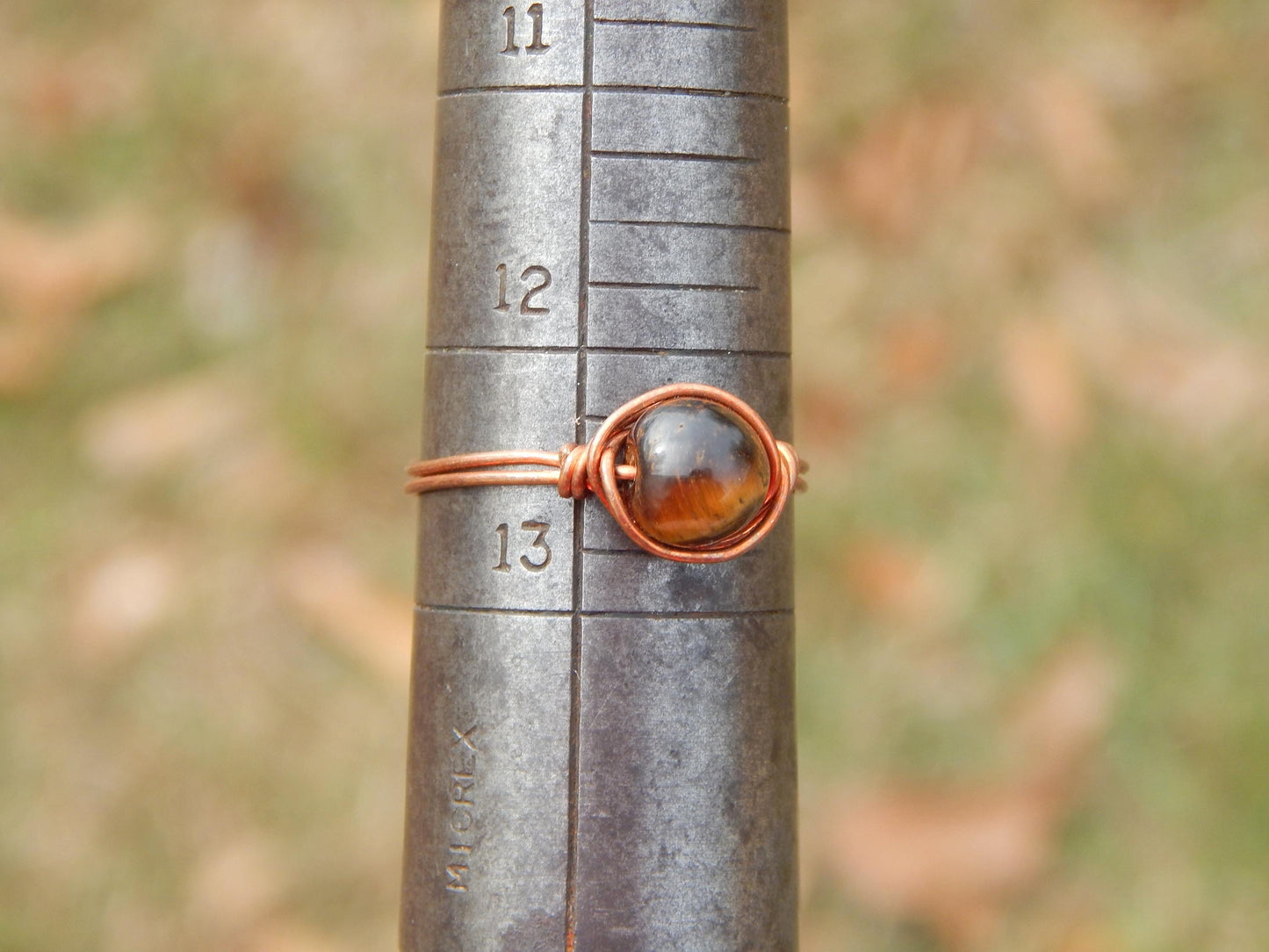 Copper wire wrapped size 12.5 tiger eye ring