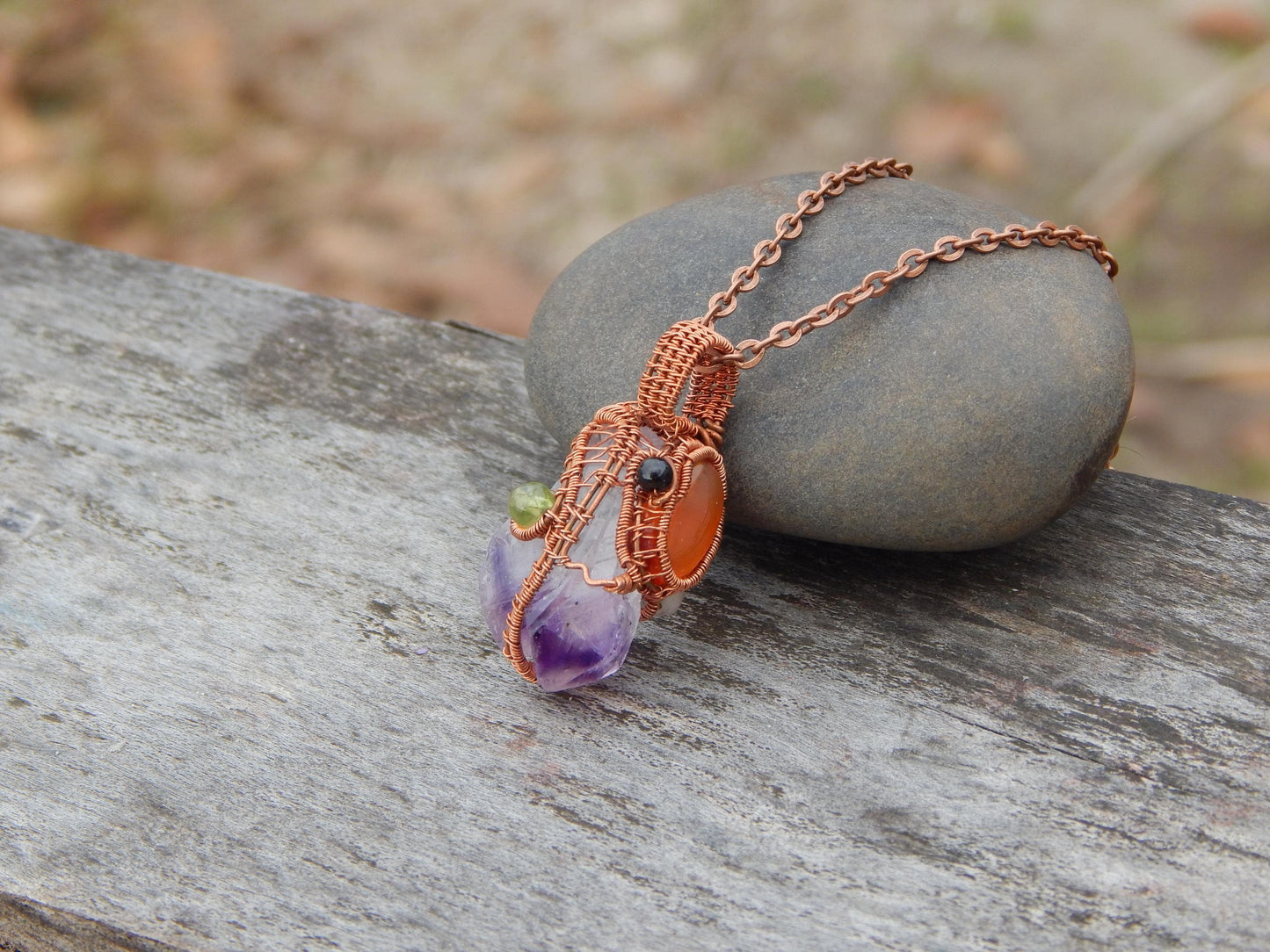 Wire wrapped amethyst crystal pendant