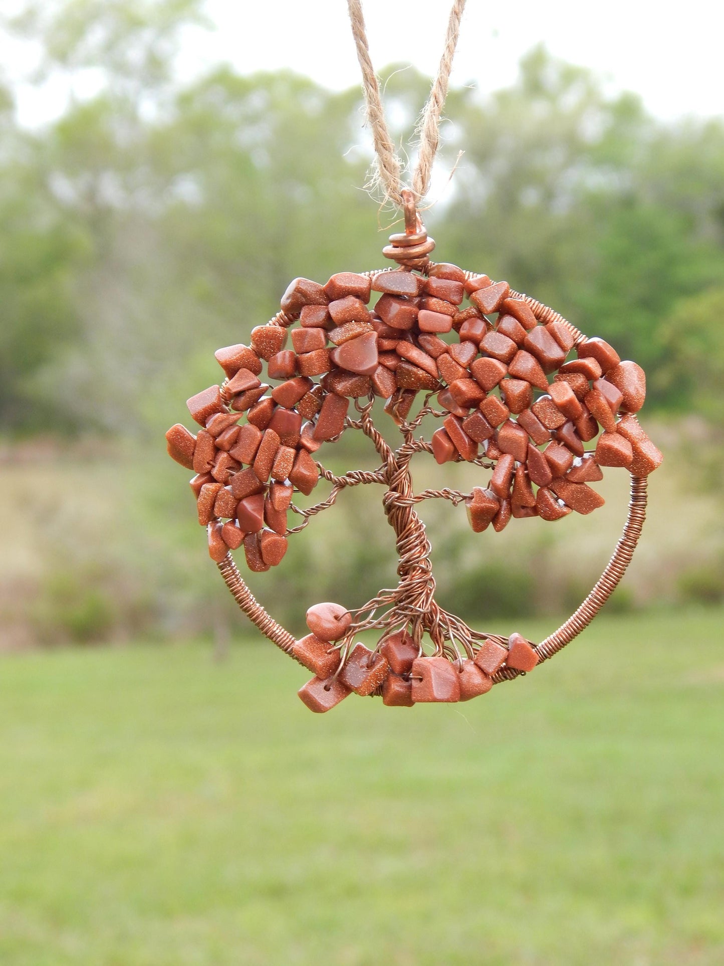 Goldstone tree of life suncatcher
