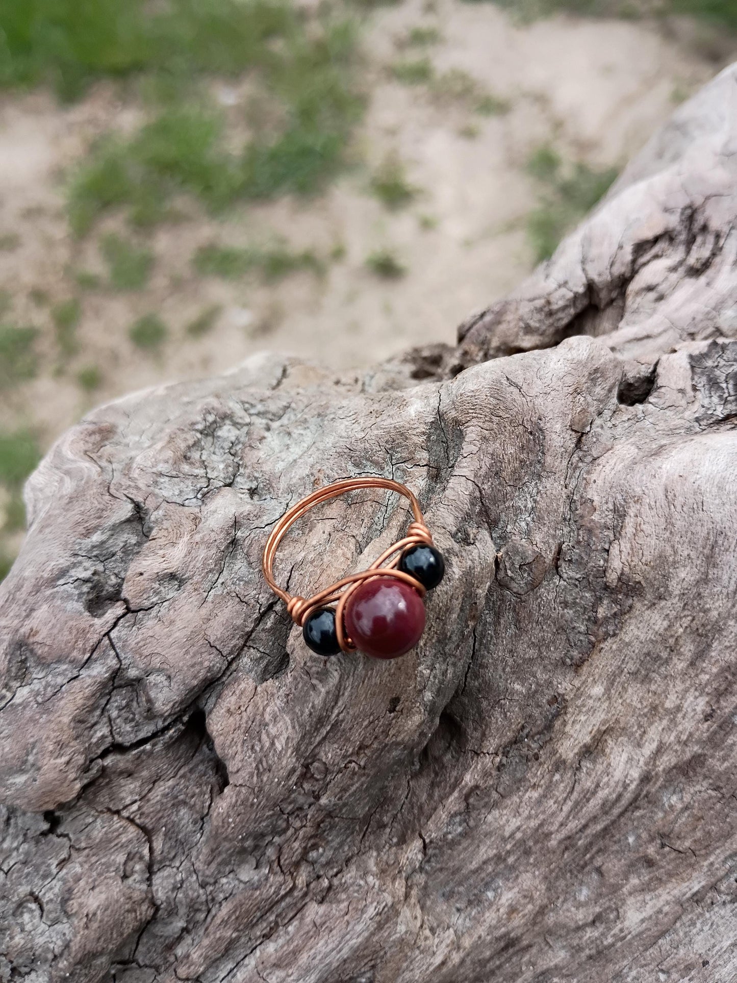 Mookaite and obsidian wire wrapped size 8 ring