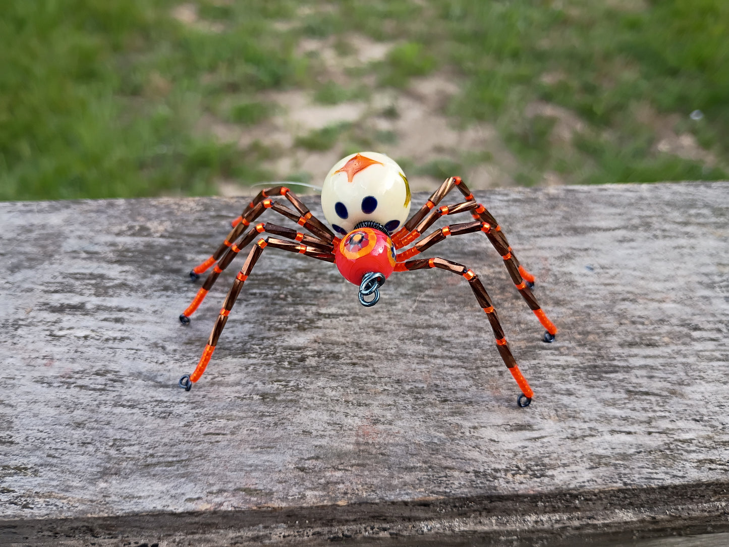Orange beaded spider ornament