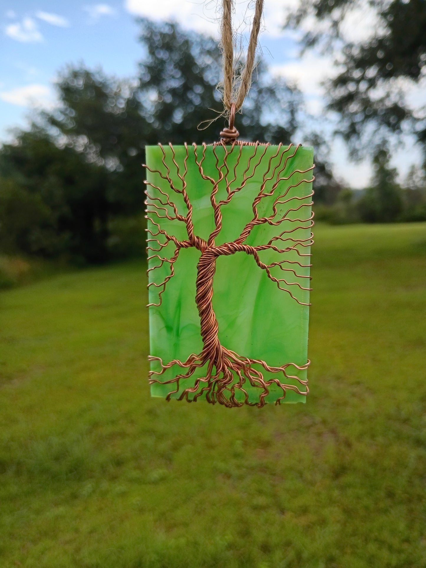 Green glass tree of life suncatcher