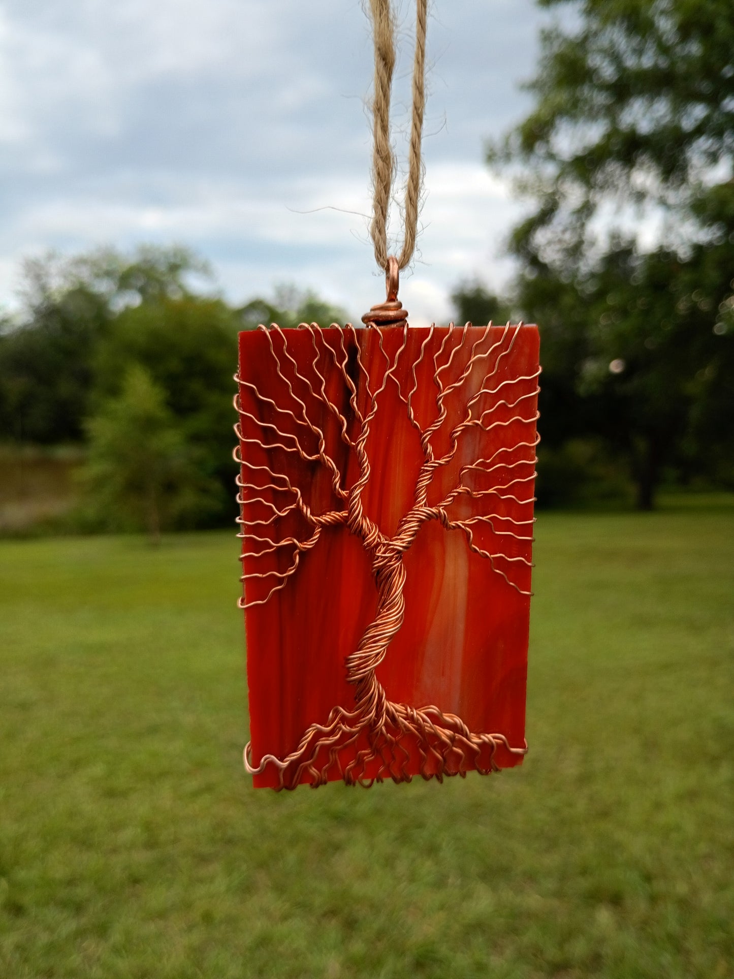 Orange glass tree of life suncatcher