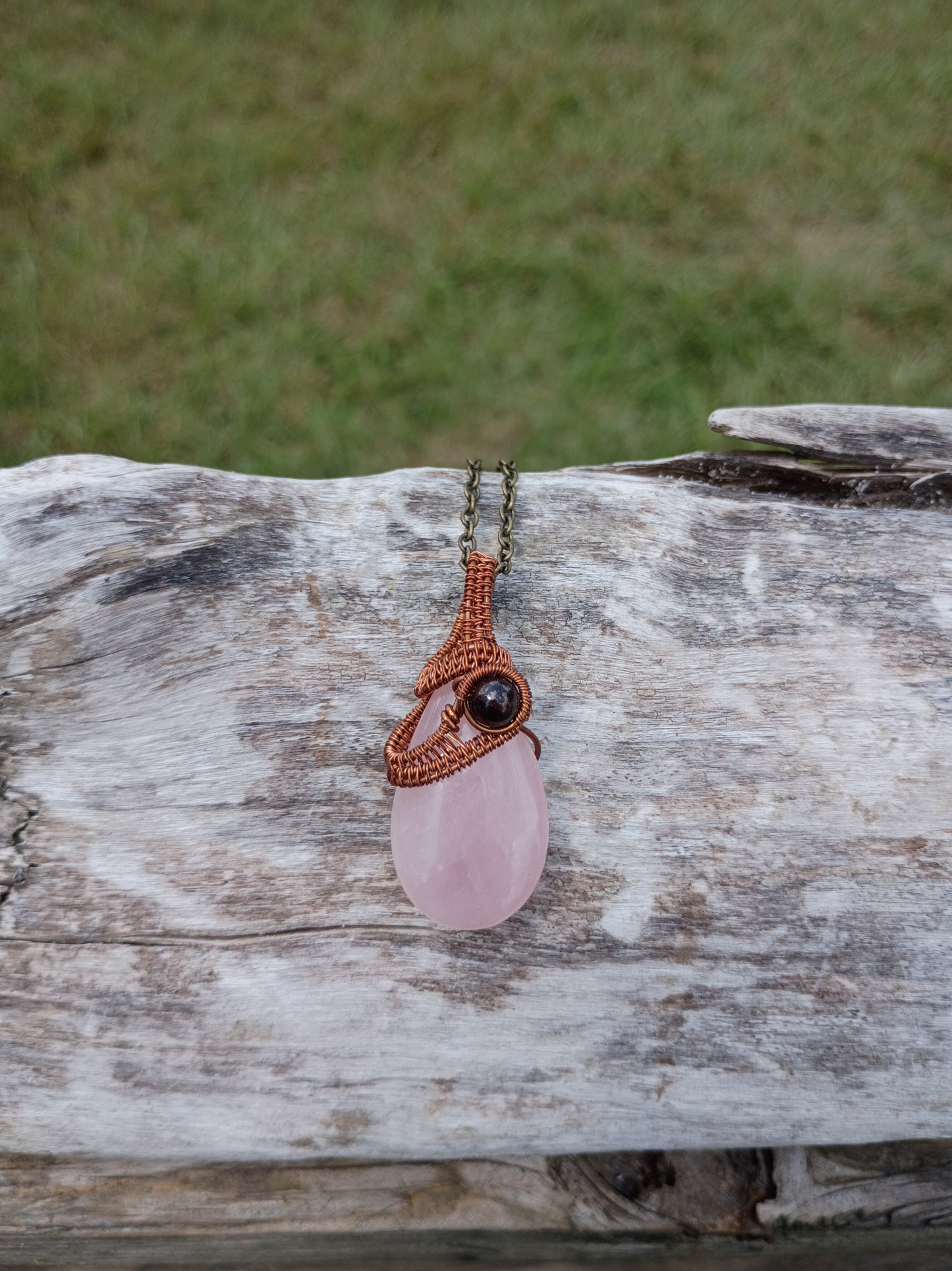 Rose quartz and garnet wire wrapped pendant