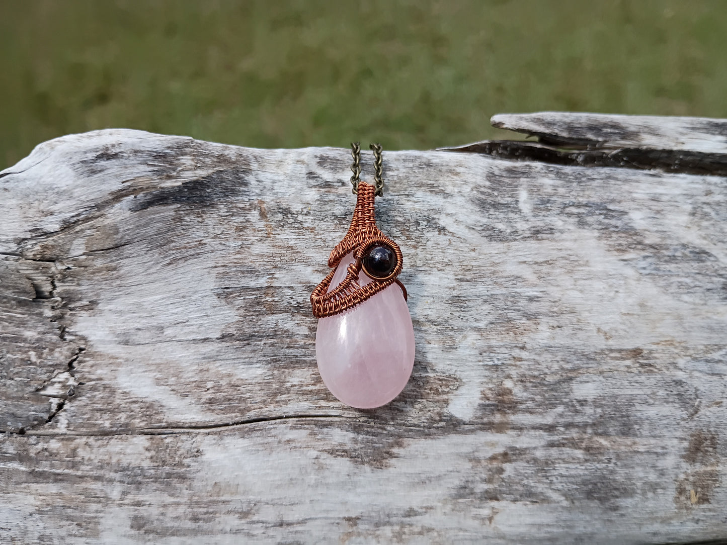 Rose quartz and garnet wire wrapped pendant