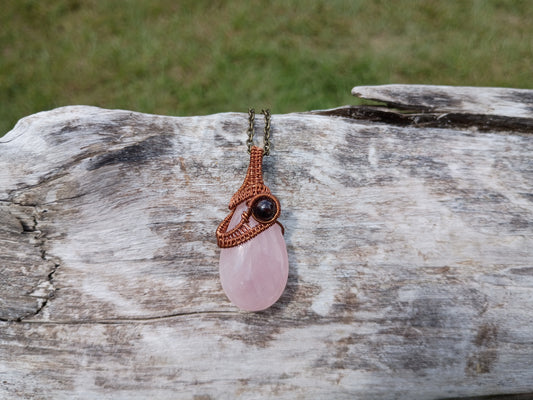 Rose quartz and garnet wire wrapped pendant