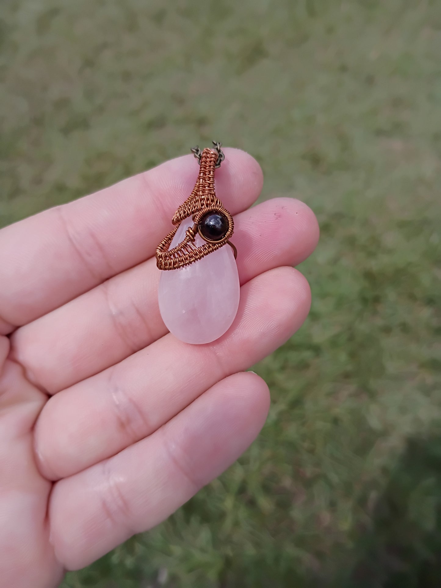 Rose quartz and garnet wire wrapped pendant