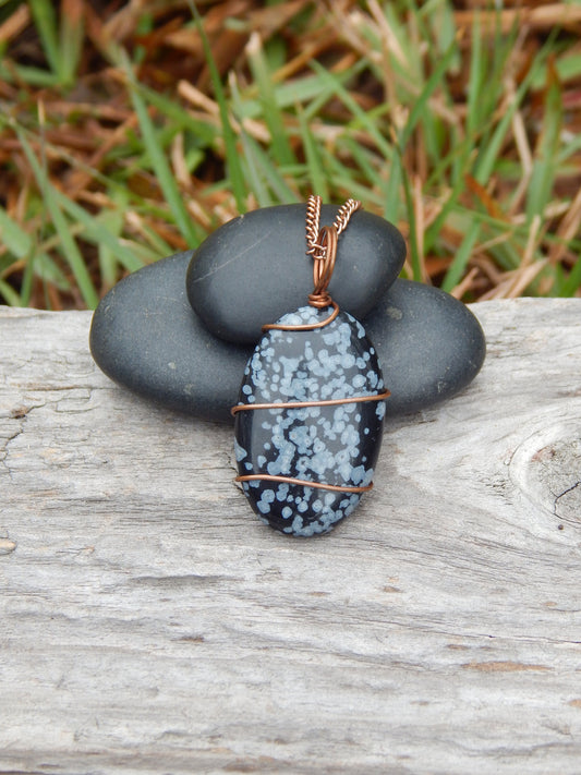 Snowflake obsidian wire wrapped pendant