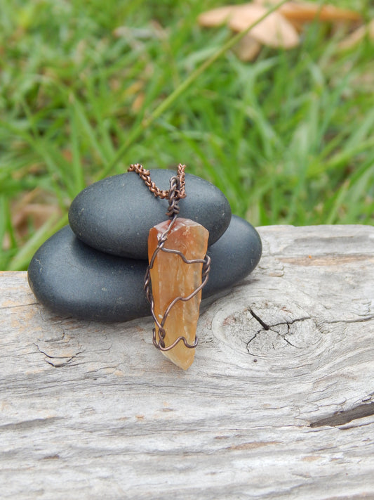 Raw calcite crystal wire wrapped pendant