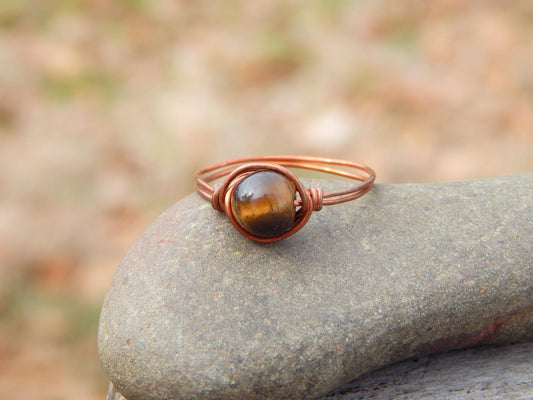 Copper wire wrapped size 12.5 tiger eye ring