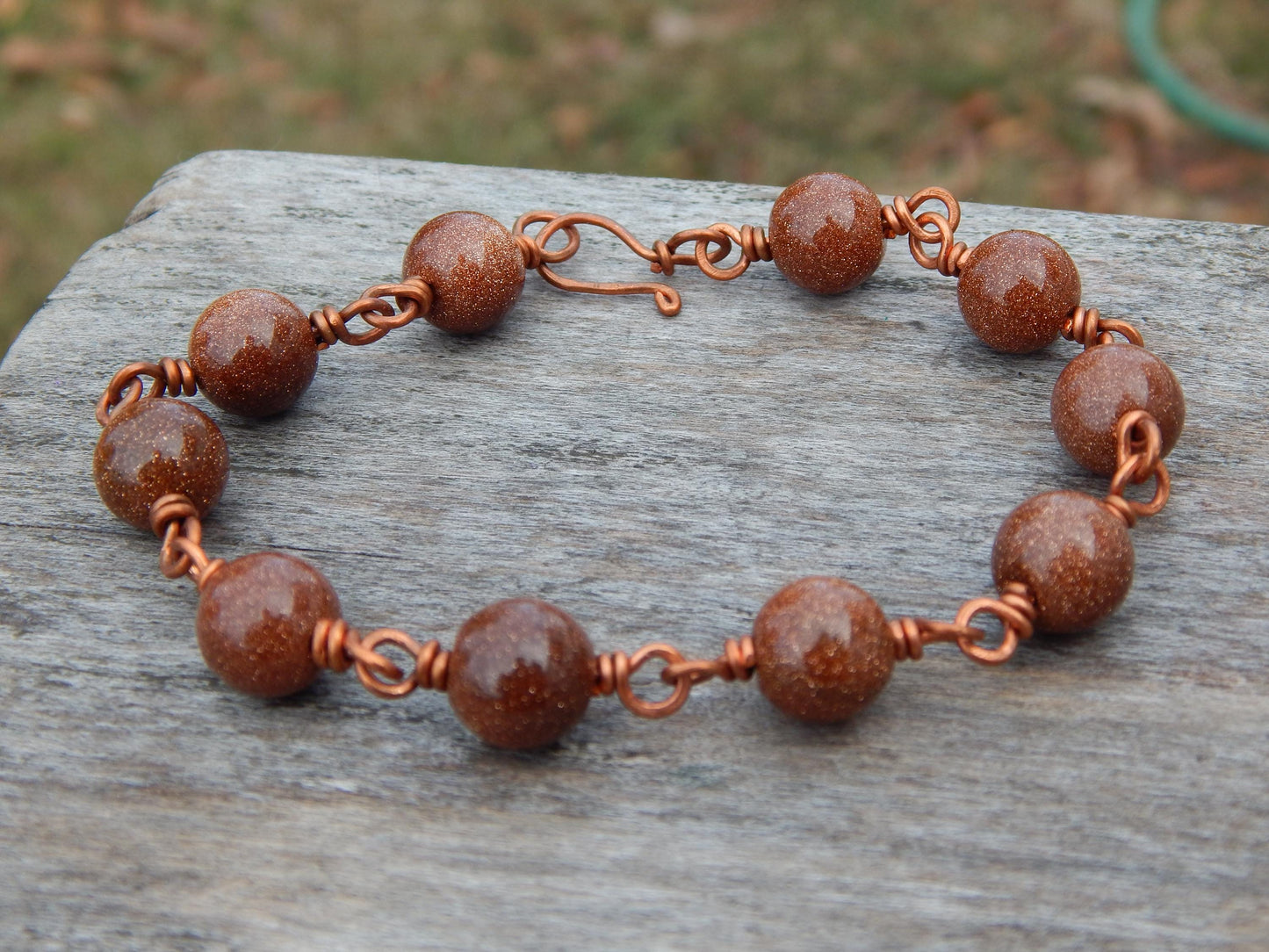 Goldstone 8 inch wire wrapped bracelet