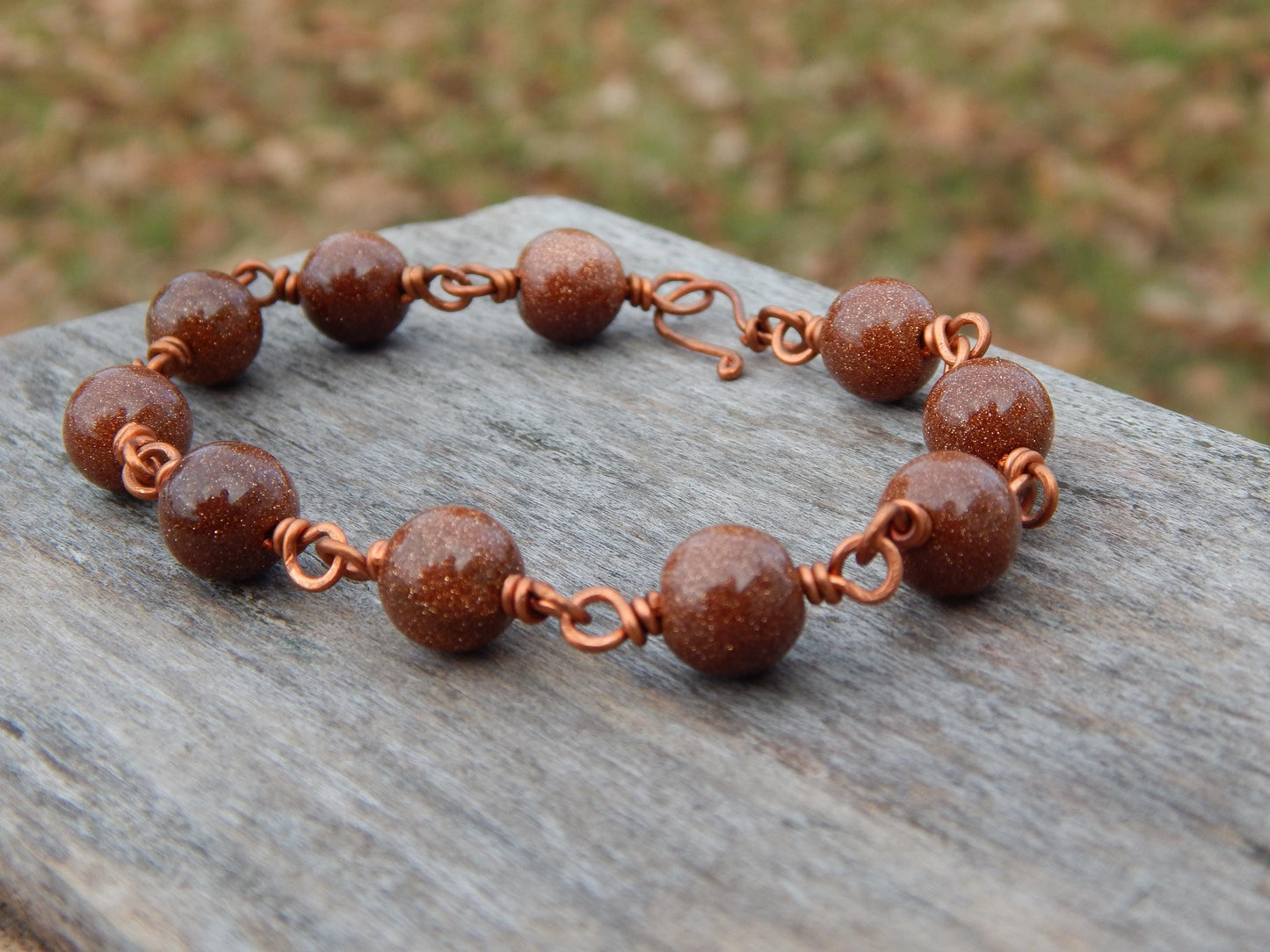 Goldstone 8 inch wire wrapped bracelet