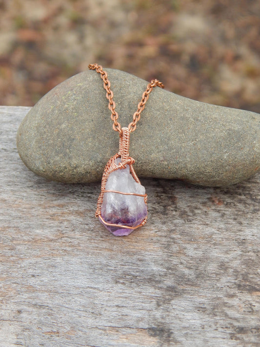 Raw amethyst crystal pendant