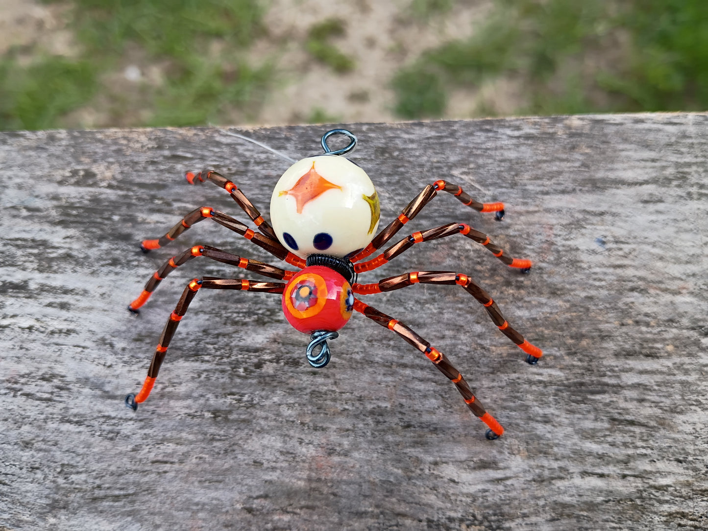 Orange beaded spider ornament