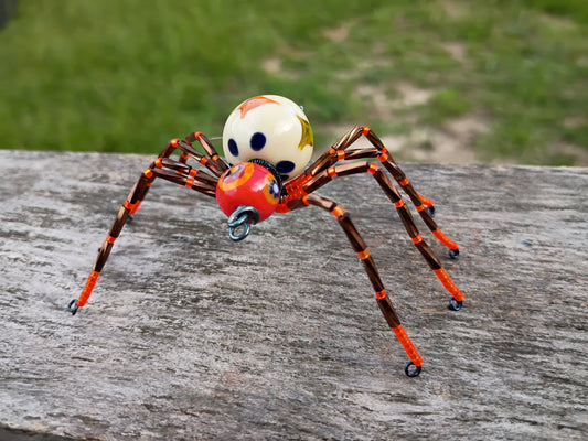 Orange beaded spider ornament