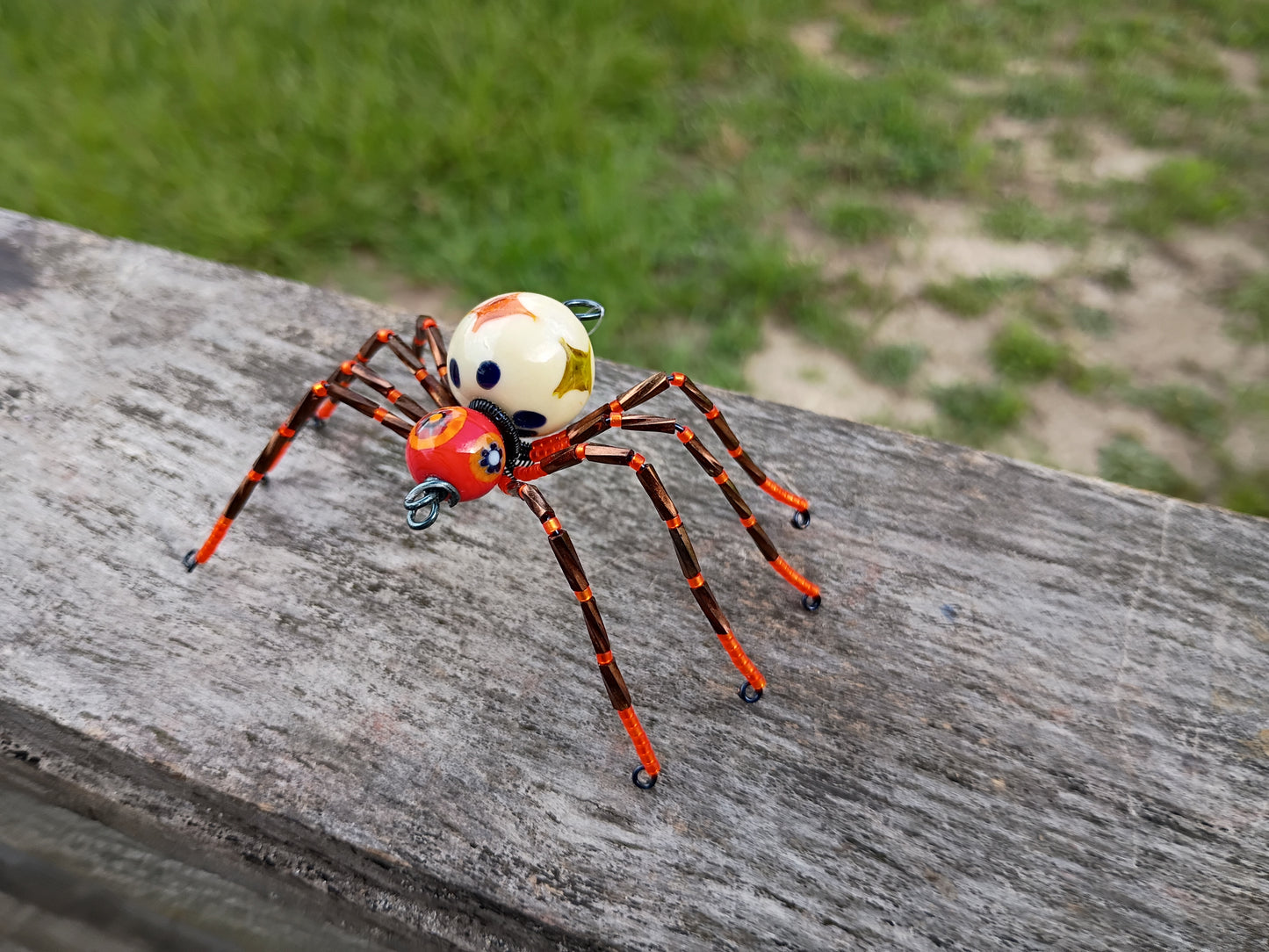 Orange beaded spider ornament
